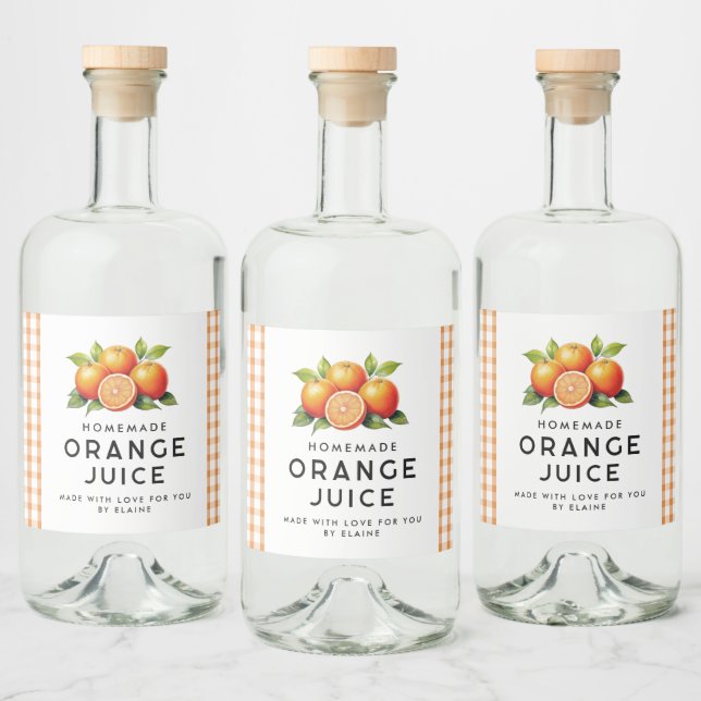 hausgemachter Orangensaft mit Orangen und Blätter Alkoholflaschenetikett (Flaschen)