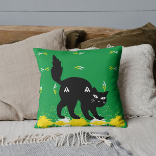 Haustier schwarze Katze weiß gelbes Muster grün ku Kissen