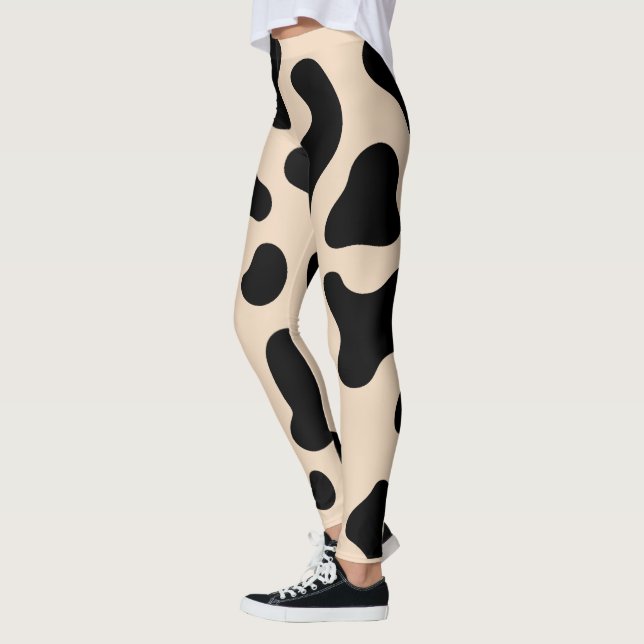 Hautfarbe und schwarze Kuh Leggings (Links)