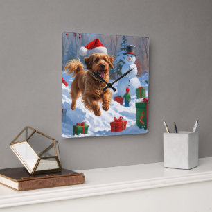 Havanese läuft im Schnee mit Weihnachtshut Quadratische Wanduhr
