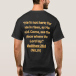 He is Alive T-Shirt<br><div class="desc">Celebrate the powerful message of the resurrection with this bold Christian design inspired by Matthew 28:6 — “He is not here; He has risen.” The artwork features the empty tomb with the stone rolled away, radiant light shining from inside, and three crosses on the hill at sunrise. This powerful imagery...</div>