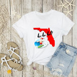 heiß! Merry Florida Christmas Surfing Santa T-Shirt<br><div class="desc">Nicht ein Fan des Winters? Wenn Sie kaltes Wetter nicht mögen, ist dies das perfekte humorvolle Shirt, um Ihre Gedanken auszudrücken! Außerdem ist es ein großartiges Weihnachts- oder Feiertagsgeschenk, oder ein einzigartiges Geschenk für Florida Bewohner und Schneevögel. Der T - Shirt ist mit dem warmen Staat von Florida in hellroter...</div>