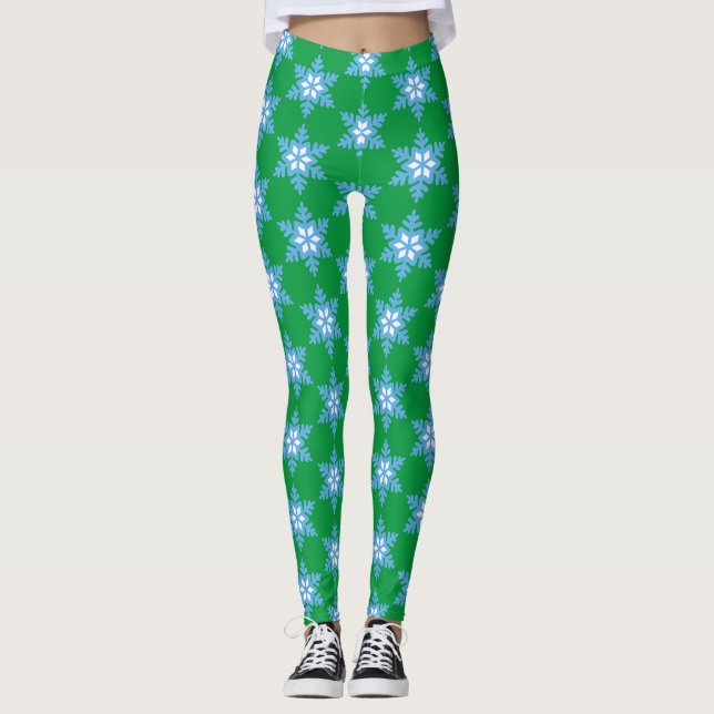 Hellblaue Schneeflocken auf hellgrünen Leggings (Vorderseite)