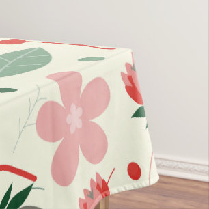Helle Blumengestaltung mit grünen Blättern und Pun Tischdecke