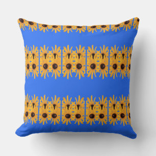 Helle, gelbe Blumen auf Royal Blue Kissen