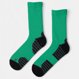 helle grüne Socken mit schwarzen Fersen und Zehen