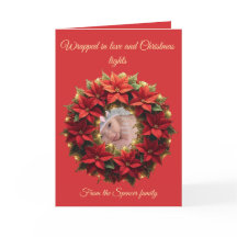 Helle rote festliche Poinsettie und Grünkreis