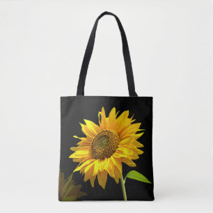 Helle Sonnenblume auf schwarzem Hintergrund Tasche