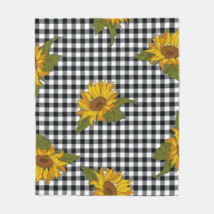 Helle Sonnenblumen auf einem schwarz-weißen Büff Fleecedecke