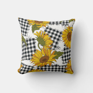 Helle Sonnenblumen-Blume auf karierten Pflastern.  Kissen