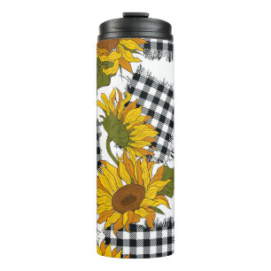 Helle Sonnenblumen-Blume auf karierten Pflastern. Thermosbecher