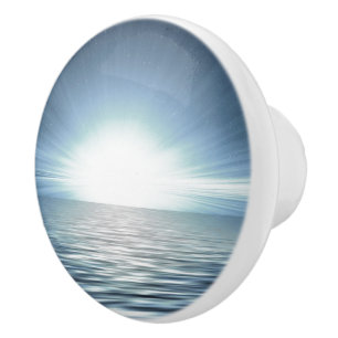 Heller Sonnenaufgang über dem blauen Ozean Dresser Keramikknauf
