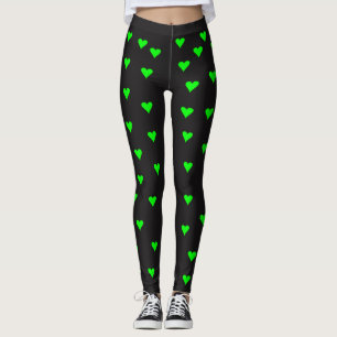 Helles grünes Herz Formen auf schwarzem Hintergru Leggings