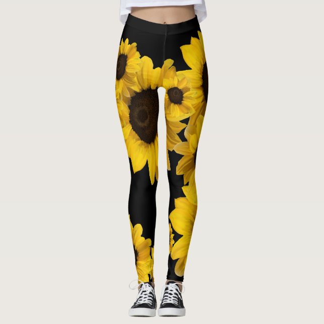 Hellgelbe Sonnenblumen auf schwarzem Hintergrund Leggings (Vorderseite)