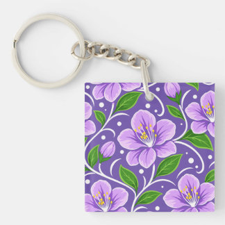 Hellviolettes Blumenmuster mit grünen Blättern Schlüsselanhänger