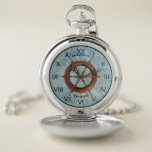 Helm Nautical Pocket Watch Blue Taschenuhr<br><div class="desc">Nautische Taschenuhr,  die mit dem eigenen Text personalisiert werden kann. Alle formatiert und bereit für Sie zu bearbeiten in der einfachen Zazzle-Editor. Entworfen mit einem Schiffshelm-Bild und schwarzen Akzenten auf abstraktem blau-grünen Hintergrund,  Ihre Wahl von Silber- oder Goldton-Gehäuse. Erstellt teilweise mit Clip Art von Angela Wenke unter resaleclipart.com</div>