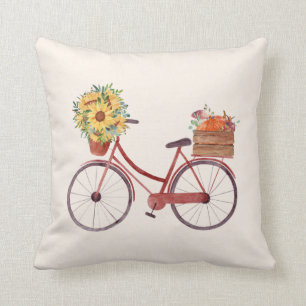 Herbst. Vintage rotes Fahrrad mit Kürbissen und So Kissen