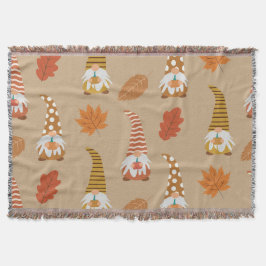 Herbstgome mit Herbstblättern und Kürbiskins Decke