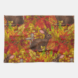 Herbstkaninchen auf rot geschirrtuch