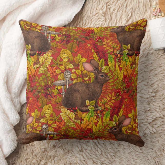 Herbstkaninchen auf rot kissen (Decke)