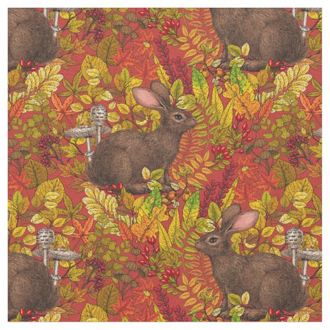 Herbstkaninchen auf rot stoff (Nahaufnahme)