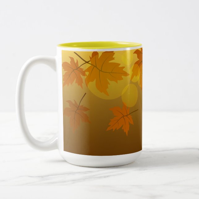 Herbstmuster mit abfallenden Ahorn-Blätter und Buc Zweifarbige Tasse (Links)