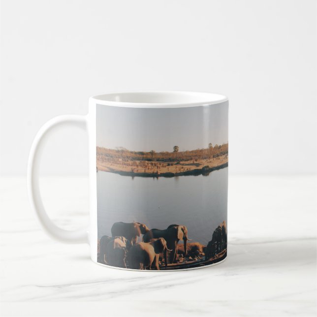 HERD OF ELEPHANT DRINKING WATER FROM LAKE KAFFEETASSE (Links)