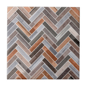 Herringbone-Muster in den Erdfelsenfarben Fliese