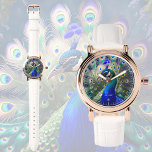 Herrlicher Pfau mit aquamarinem und goldenem Abstu Armbanduhr<br><div class="desc">Diese Uhr besticht durch ein prächtiges Pfauendesign in wunderschönen aquamarinen,  königsblauen und goldenen Farbtönen. Romantisches und elegantes Motiv. Perfektes und personalisierbares Geschenk für jeden Anlass.</div>