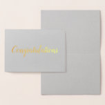 Herzlichen Glückwunsch Elegantes Brushstroke Scrip Folienkarte<br><div class="desc">Feiern Sie mit dieser schönen Karte! Das Wort "Gratulationen" erscheint in Goldfolie über einem grauen Hintergrund in einem handgeschriebenen Pinsel (Pinselstrich)-Skript-Schriftart. Die Innenseite der Karte ist leer,  bereit für Ihre persönliche Nachricht. Ideal für Hochzeit,  Verlobung,  Jubiläum,  Neugeburt,  Abschluss,  Neuarbeit,  Werbeaktion,  Ruhestand oder jede andere glückliche Veranstaltung oder Leistung.</div>