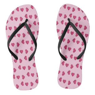 Herzmuster aus rosa Kristallen Flip Flops