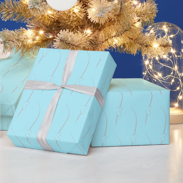 Herzverbindung über mittleres türkisfarbenes Schle Geschenkpapier (Feiertage)