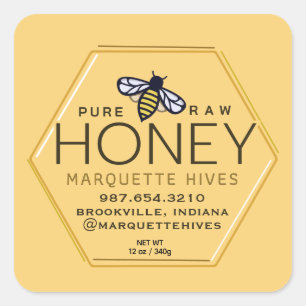 Hexagon de miel jaune Étiquette avec abeilles et p