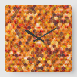 Hexagonmosaik an Stellen in rötlichen Tönen werfen Quadratische Wanduhr