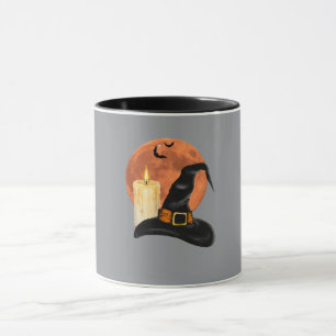 Hexenhut & Kerze unter dem orangefarbenen Hallowee Tasse