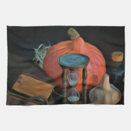 Hexereiobjekte auf einem Tisch in einem dunklen Ra Handtuch