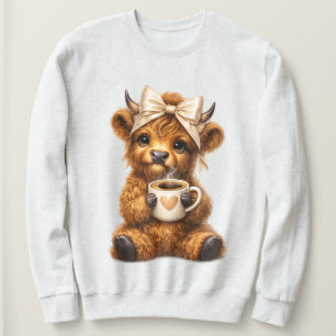 Highland-Kuh trinkt Kaffee und trägt süße Leoparde Sweatshirt
