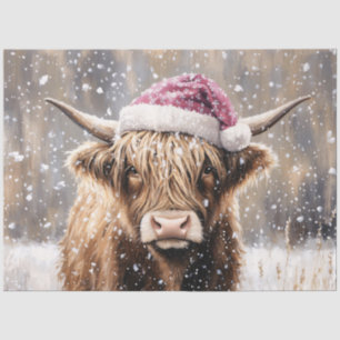 Highland-Rind im Schnee mit Weihnachtsmannmütze Seidenpapier