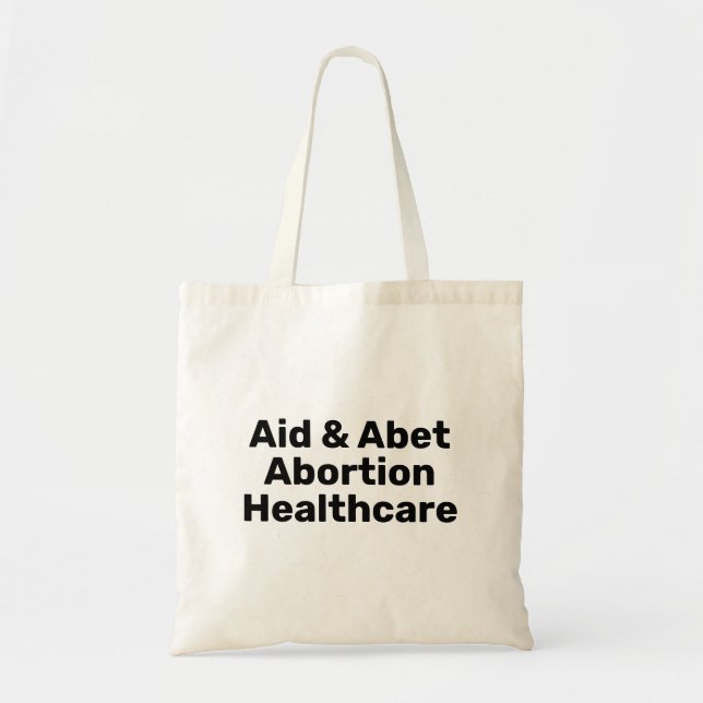 Hilfe & Abet Abortion Gesundheitswesen schwarze Ty Tragetasche (Vorne)