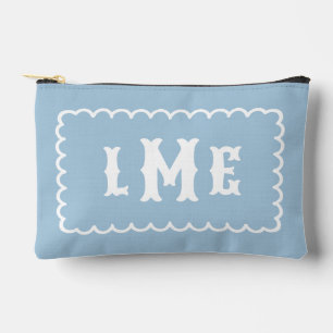 Himmelblaues und weißes monogramm mit wellenförmig zubehörtasche