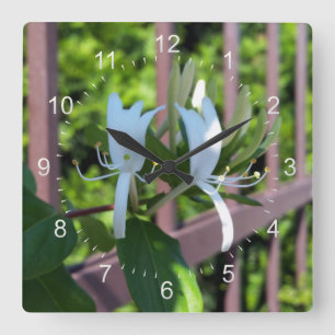 hintereinander quadratische wanduhr