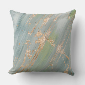 Hintergrund aus grauem Marmor mit goldenen Pinsels Kissen