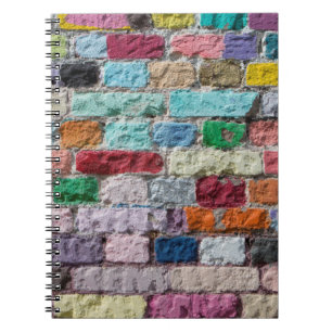 Hintergrund der Wandstruktur aus lackiertem Ziegel Notizblock