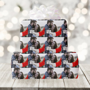 Hinweis des Weihnachtsmanns in Handüberlagerung Be Geschenkpapier