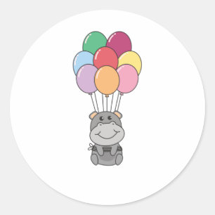 Hippopotamus fliegt mit farbenfrohen Balloons. Runder Aufkleber