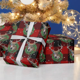 Hirsche und Weihnachtskranz in Schneeflocken Geschenkpapier