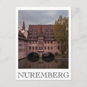 Historisches Gebäude bei Sonnenuntergang in Nürnbe Postkarte
