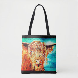 Hochlandkuh auf einer Tasche