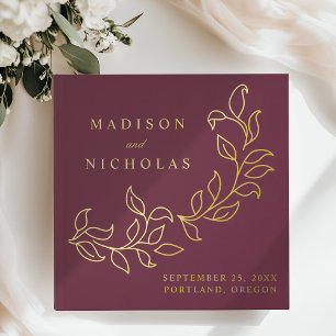 Hochzeit mit kaskadierendem Merlot und Goldfolienb Gästebuch