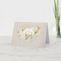 Hochzeitsrennen in Seashell und Sand